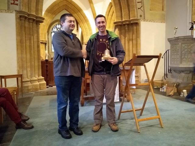 Matthew Hilling receiving the Higby Trophy from Benjamin Kipling